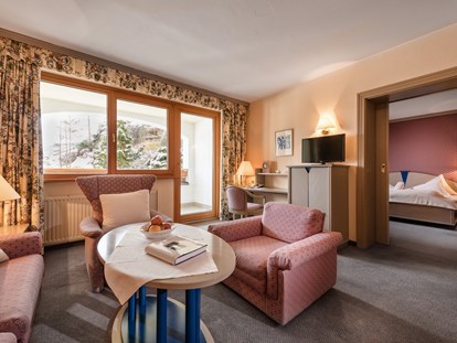 Hotels an der Piste - Hotel-Schwerpunkt: Skifahren & Familie - Wohnzimmer Grande Suite superieur Sterntaler - Hotel St. Oswald