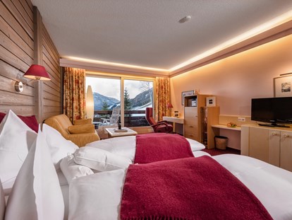 Hotels an der Piste - Hotel-Schwerpunkt: Skifahren & Wellness - Kanzelhöhe - Unsere familienfreundliche Suite Wildrose - Hotel St. Oswald
