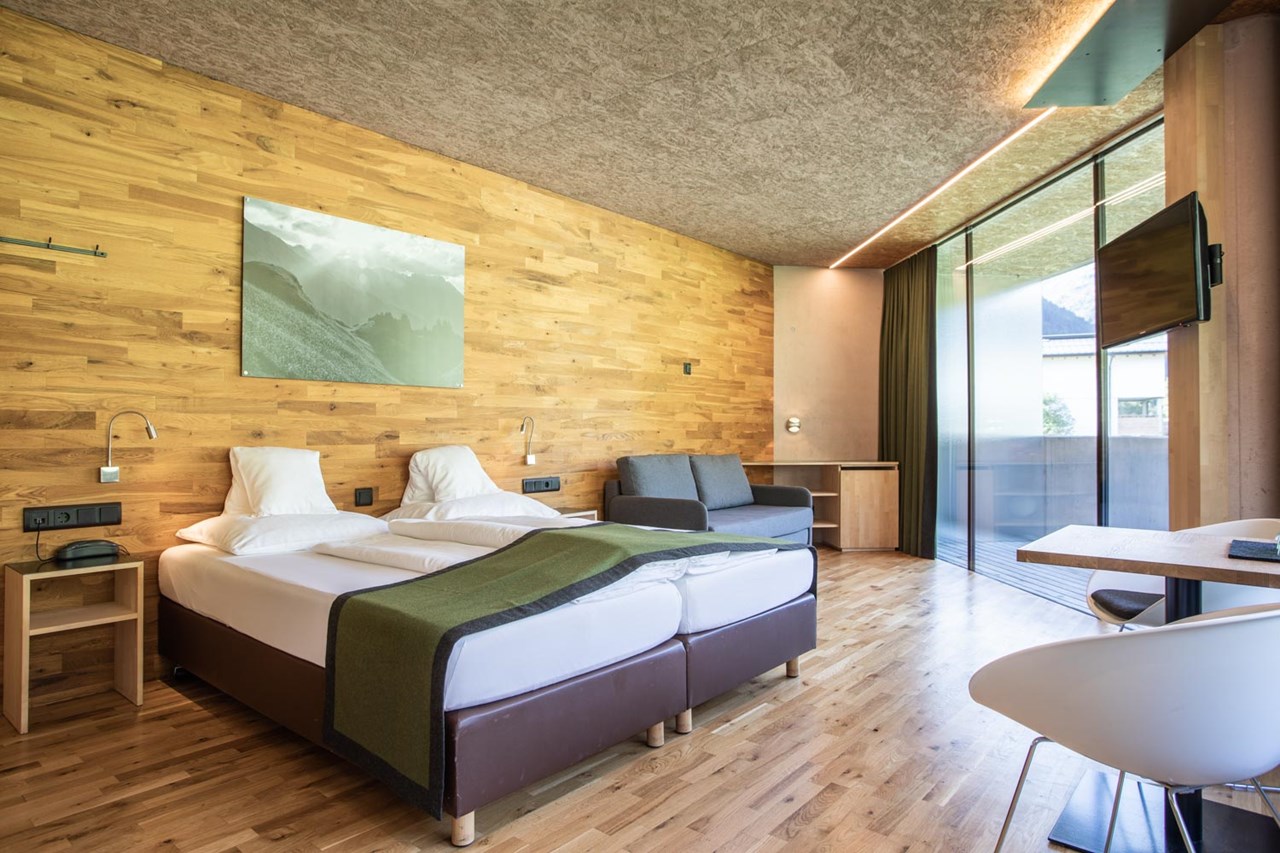 Hotel Arlmont Zimmerkategorien Doppelzimmer Superior mit Bergblick und Balkon