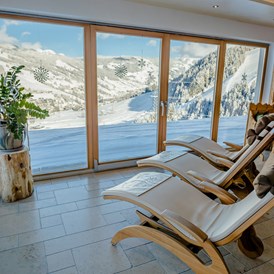 Skihotel: Ferienwohnung mit Sauna in Saalbach-Hinterglemm. Unser Panoramawellnessbereich hat eine atemberaubende Aussicht auf Hinterglemm - Ferienwohnungen Perfeldhof