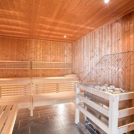 Skihotel: Sauna - COOEE alpin Hotel Kitzbüheler Alpen