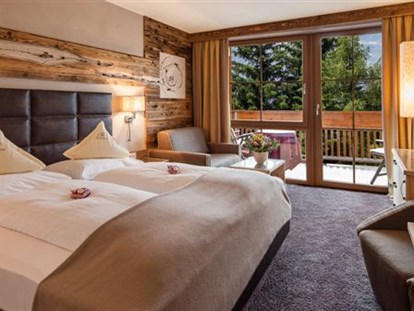 Hotels an der Piste - Suite mit offenem Kamin - Zimmer Larchwaldele  - Wohlfühlhotel Falzeben