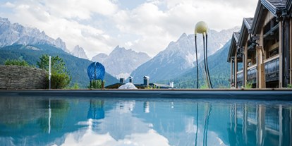 Hotels an der Piste - Naturbadeteich - Berghotel Sexten Dolomiten