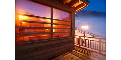 Hotels an der Piste - Südtirol - Außensauna - Berghotel Sexten Dolomiten