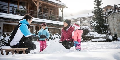 Hotels an der Piste - Skikurs direkt beim Hotel: für Kinder - Post Alpina - Family Mountain Chalets