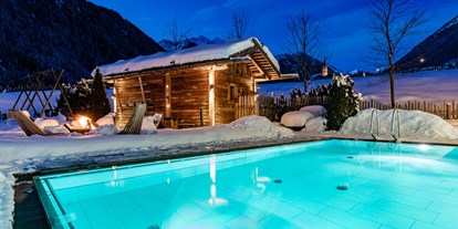 Hotels an der Piste - Skiraum: Skispinde - Pool - Hotel Masl