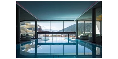 Hotels an der Piste - Ladestation Elektroauto - Wolkenstein/Gröden Südtirol - Familienhotel Huber