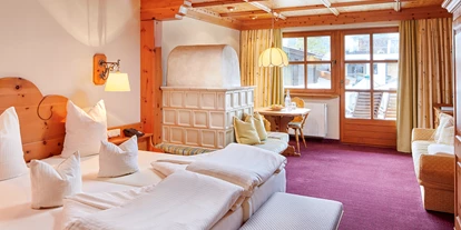 Hotels an der Piste - Pools: Außenpool beheizt - Rauth (Nesselwängle) - Zimmer - Tirolerhof Familotel Zugspitze