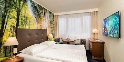 Hotels an der Piste - Hotel-Schwerpunkt: Skifahren & Familie - Thum - Hotelzimmer - AHORN Hotel Am Fichtelberg