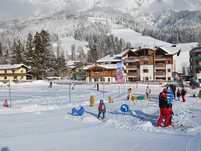 Hotels an der Piste - Hotel-Schwerpunkt: Skifahren & Familie - Enkerbichl - Ski-Kinderland - Boutique Hotel Das Rivus