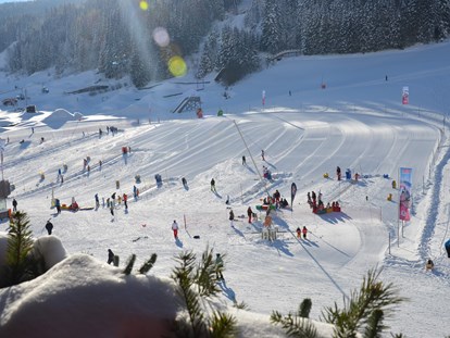 Hotels an der Piste - Skiraum: videoüberwacht - Jochberg (Jochberg) - Ski-Kinderland - Boutique Hotel Das Rivus