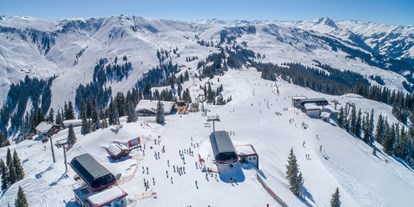 Hotels an der Piste - Après Ski im Skigebiet: Skihütten mit Après Ski - Saalbach - Skigebiet KitzSki Kitzbühel/Kirchberg