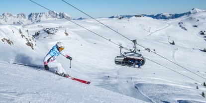Hotels an der Piste - Après Ski im Skigebiet: Schirmbar - Saalbach - Skigebiet KitzSki Kitzbühel/Kirchberg