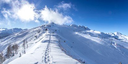 Hotels an der Piste - Après Ski im Skigebiet: Schirmbar - Tiroler Unterland - Skigebiet Spieljochbahn
