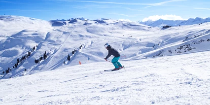 Hotels an der Piste - Après Ski im Skigebiet: Schirmbar - 75 km schneesicher Pisten - Wildkogel-Arena Neukirchen & Bramberg