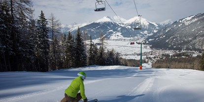 Hotels an der Piste - Après Ski im Skigebiet: Schirmbar - Wettersteinbahn perfekte Piste am Fuße der Zugspitze - Skigebiet Ehrwalder Wettersteinbahnen
