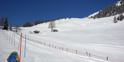 Hotels an der Piste - Après Ski im Skigebiet: Schirmbar - Außerfragant - Skigebiet Emberger Alm