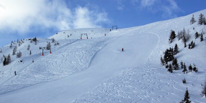Hotels an der Piste - Après Ski im Skigebiet: Skihütten mit Après Ski - Neusach - Skigebiet Emberger Alm