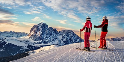 Hotels an der Piste - Après Ski im Skigebiet: Skihütten mit Après Ski - Italien - Skigebiet Dolomites Val Gardena/Gröden - St. Christina - St. Ulrich - Wolkenstein