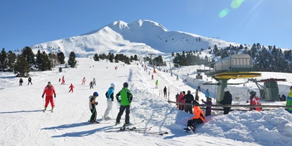 Hotels an der Piste - Rodelbahn - Einfache Übungshänge für die ersten Skischwünge - Skigebiet Jochgrimm