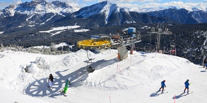 Hotels an der Piste - Preisniveau: € - Umgeben von den Dolomitengipfeln - Skigebiet Jochgrimm