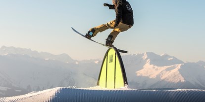 Hotels an der Piste - Après Ski im Skigebiet: Skihütten mit Après Ski - Skigebiet Flims Laax Falera