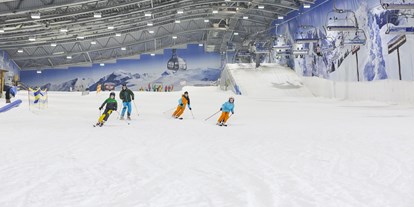Hotels an der Piste - Preisniveau: €€ - Schneespaß mit der ganzen Familie. - Skihalle Neuss im Alpenpark Neuss