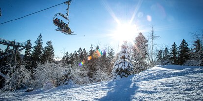 Hotels an der Piste - Après Ski im Skigebiet: Skihütten mit Après Ski - Sauerland - Skiliftkarussell Winterberg