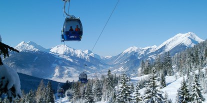 Hotels an der Piste - Preisniveau: €€€ - Skigebiet Wetterstein - 8er-Kabinenbahn Ehrwalder Almbahn - Ehrwalder Almbahn
