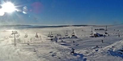 Hotels an der Piste - Après Ski im Skigebiet: Schirmbar - Panorama-Sesselbahn Osthang - Postwiesen Skidorf Neuastenberg