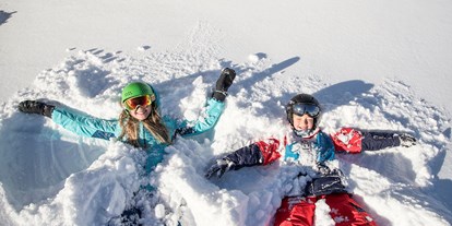 Hotels an der Piste - Après Ski im Skigebiet: Schirmbar - Saalbach - Viele Angebote für Kinder auf der Steinplatte in Waidring  - Skigebiet Steinplatte | Winklmoosalm