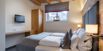 Hotels an der Piste - Wellnessbereich - Jochberg (Mittersill, Hollersbach im Pinzgau) - Zimmeransicht - Ski & Bike Hotel Wiesenegg