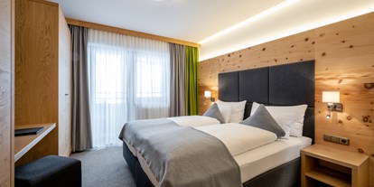 Hotels an der Piste - Skicircus Saalbach Hinterglemm Leogang Fieberbrunn - Zimmeransicht - Ski & Bike Hotel Wiesenegg