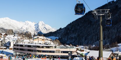 Hotels an der Piste - Skiraum: Skispinde - Hotel Arlmont Außen  - Hotel Arlmont