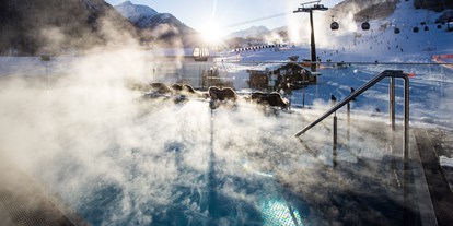 Hotels an der Piste - Skiraum: Skispinde - ROOFTOP Pool  - Hotel Arlmont