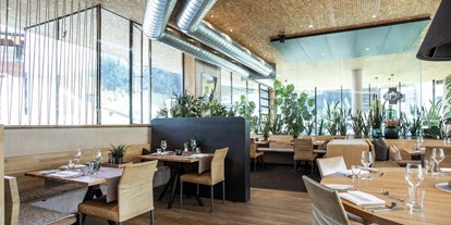 Hotels an der Piste - Skiraum: Skispinde - Restaurant - Hotel Arlmont