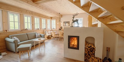 Hotels an der Piste - geführte Skitouren - Steiermark - Wohnraum im Ferienhaus Grundlsee - Narzissendorf Zloam