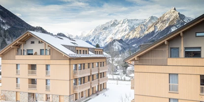 Hotels an der Piste - Hotel-Schwerpunkt: Skifahren & Familie - Haselbäckau - Winter Aussenansicht - ALPRIMA Aparthotel Hinterstoder