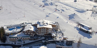 Hotels an der Piste - Hotel-Schwerpunkt: Skifahren & Wellness - Jochberg (Jochberg) - Direkt an der Piste mit Einstiegslift in den Skicircus - Wellness- und Familienhotel Egger in TOP LAGE