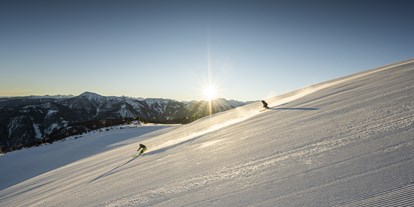 Hotels an der Piste - Skiservice: Skireparatur - Heißingfelding - Hotel Tannenhof Alpendorf