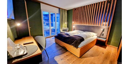 Hotels an der Piste - Rodeln - Grächen - AMBER SKI-IN / OUT HOTEL & SPA