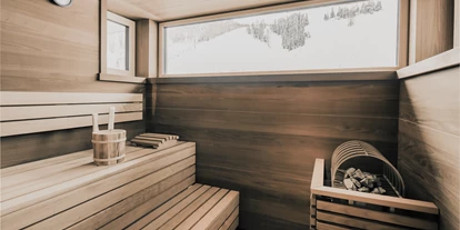 Hotels an der Piste - Parkplatz: gebührenpflichtig beim Hotel - Hintermuhr - Die eigene, private Sauna in unserer Panorama Suite - FIRSTpeak Zauchensee