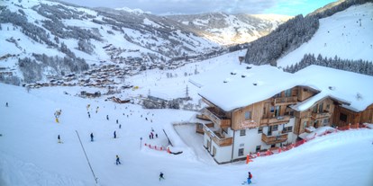 Hotels an der Piste - Ski-In Ski-Out - Skiurlaub direkt an der Skipiste am Zwölferkogel in Hinterglemm - Ferienwohnungen Perfeldhof