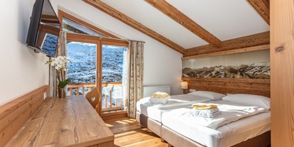 Hotels an der Piste - Hotel-Schwerpunkt: Skifahren & Familie - Zimmerbeispiel der Ferienwohnung 80 im Dachgeschoss - Ferienwohnungen Perfeldhof