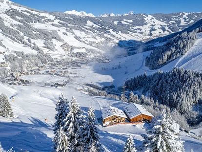 Hotels an der Piste - Hotel-Schwerpunkt: Skifahren & Familie - Prama - Winter in Saalbach-Hinterglemm - Ferienwohnungen Perfeldhof