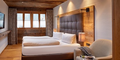 Hotels an der Piste - Hotel-Schwerpunkt: Skifahren & Ruhe - Großarl - Schlafzimmer mit Doppelbett - Promi Alm Flachau