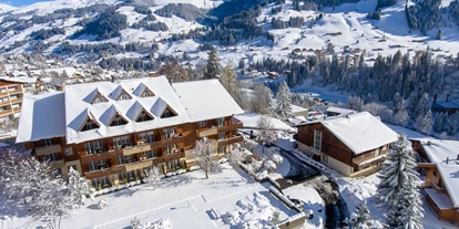 Hotels an der Piste - Parkplatz: gebührenpflichtig beim Hotel - Bern - Aussenansicht Winter - Hotel Steinmattli