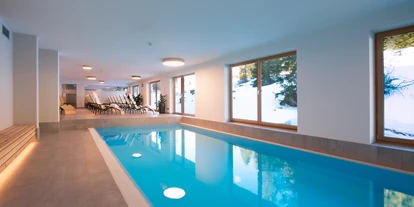 Hotels an der Piste - Wellnessbereich - Wolkenstein/Gröden Südtirol - Schwimmbad mit Blick auf Skipiste - Sports&Nature Hotel Boè