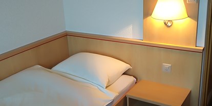 Hotels an der Piste - Preisniveau: günstig - Mädris-Vermol - Einer Zimmer DU/WC - TV  - Hotel Pizzeria Mittenwald Flumserberg Tannenheim