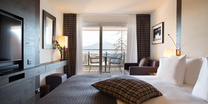Hotels an der Piste - Hotel-Schwerpunkt: Skifahren & Familie - Turtmann - Alpina Deluxe room - Hotel Crans Ambassdor